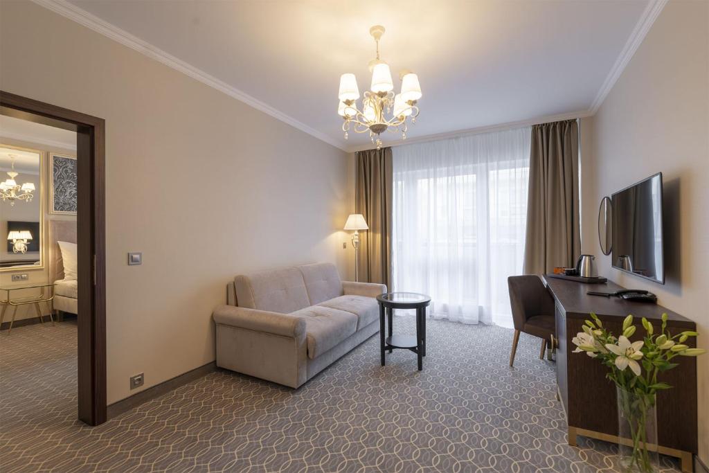 TV a/nebo společenská místnost v ubytování Spa Hotel ULRIKA