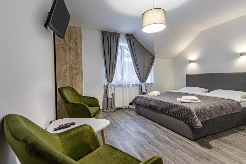 Postel nebo postele na pokoji v ubytování Konopka Forest Home & SPA