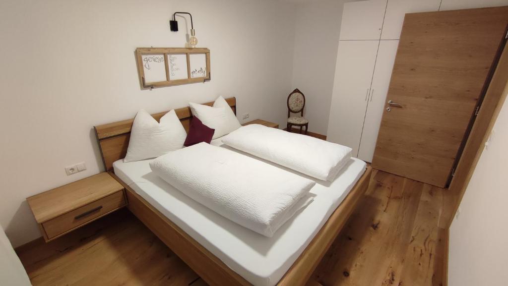 Ένα ή περισσότερα κρεβάτια σε δωμάτιο στο Residence Maximilian