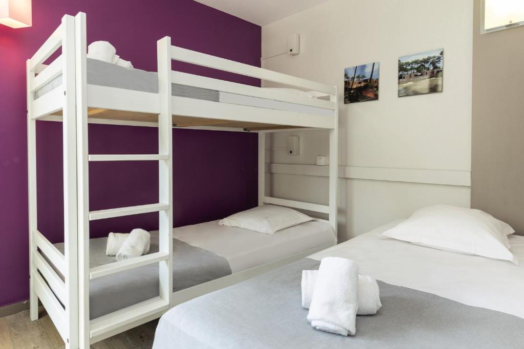 Bunk bed o mga bunk bed sa kuwarto sa Belambra Clubs Seignosse - Les Tuquets