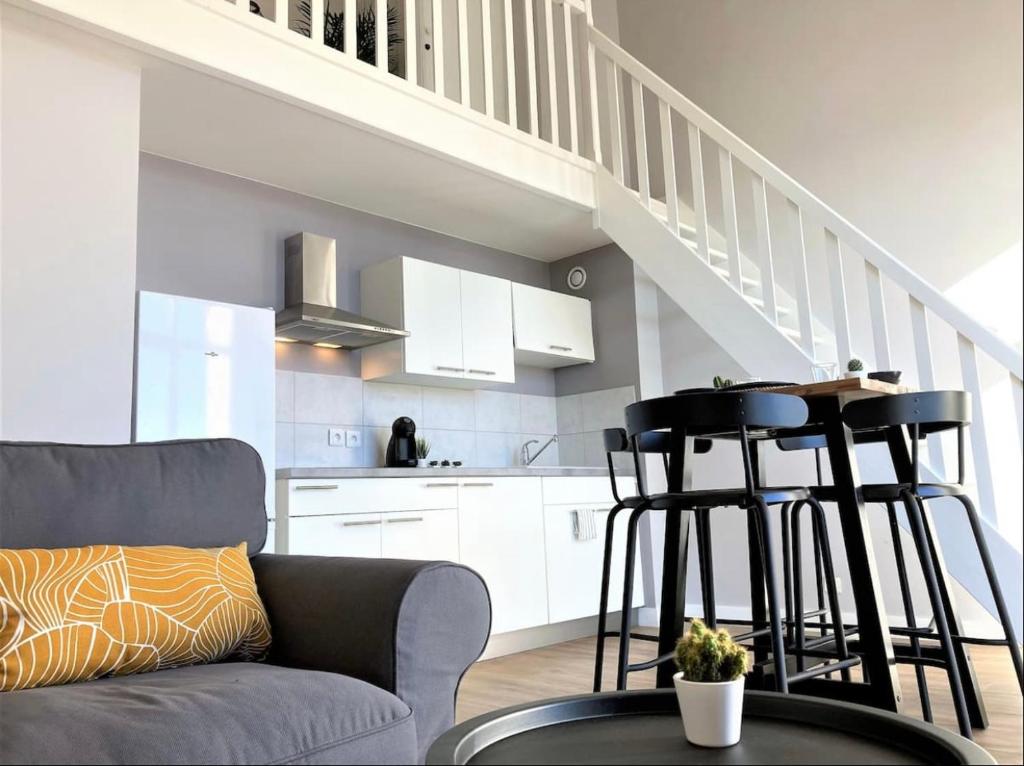 A kitchen or kitchenette at Sacré cœur - Duplex avec balcon - 4 pers