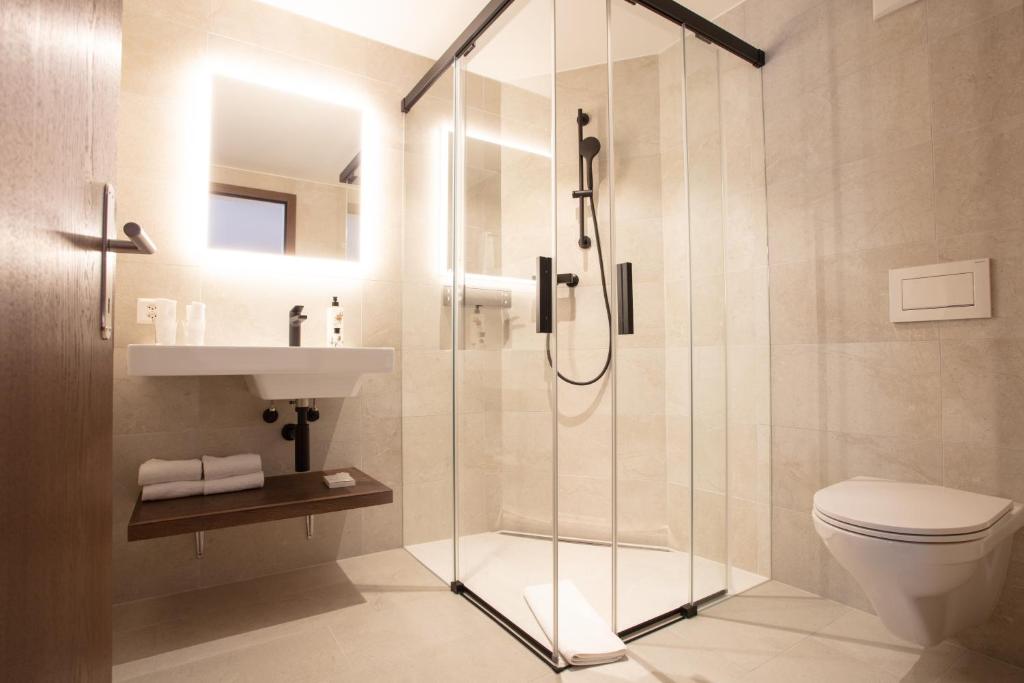 Koupelna v ubytování Posthotel Valbella