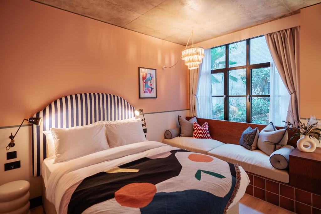 Postel nebo postele na pokoji v ubytování room2 London Chiswick Hometel
