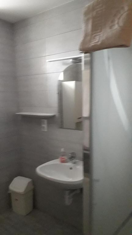 Łazienka w obiekcie Orchidea Apartman