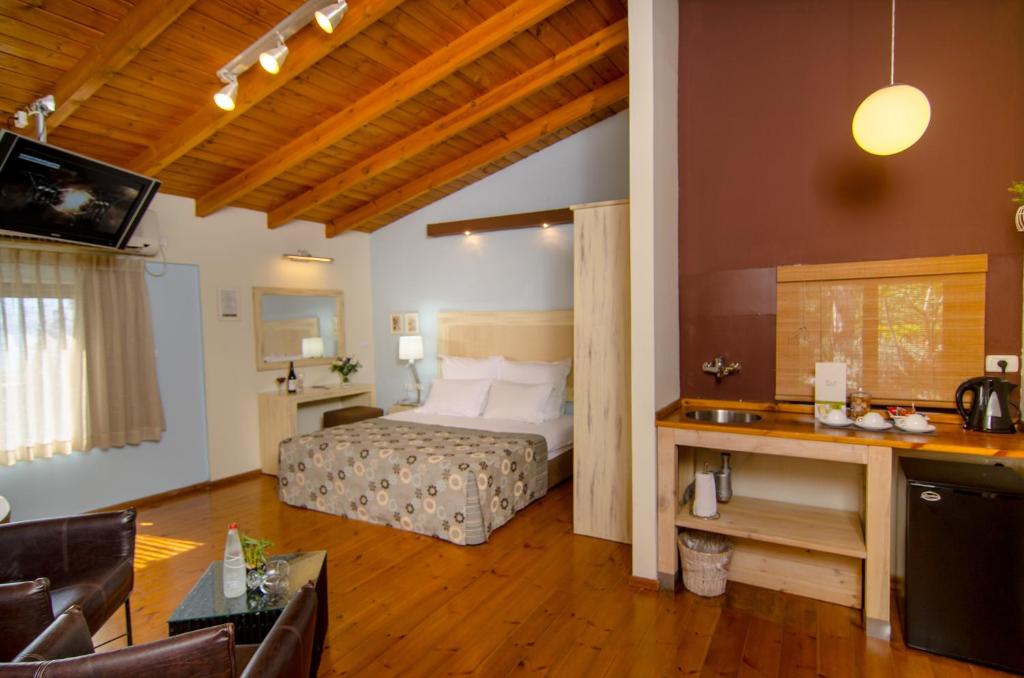 Postel nebo postele na pokoji v ubytování Ramot Resort Hotel