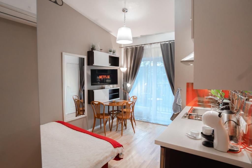 TV a/nebo společenská místnost v ubytování Alpetri Apartments