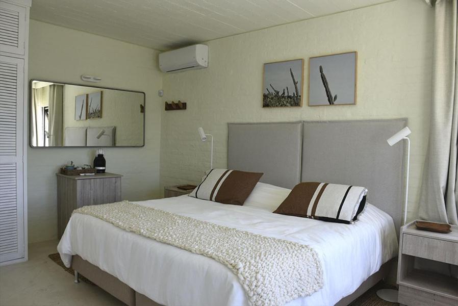 Postel nebo postele na pokoji v ubytování Posada Tamarindo