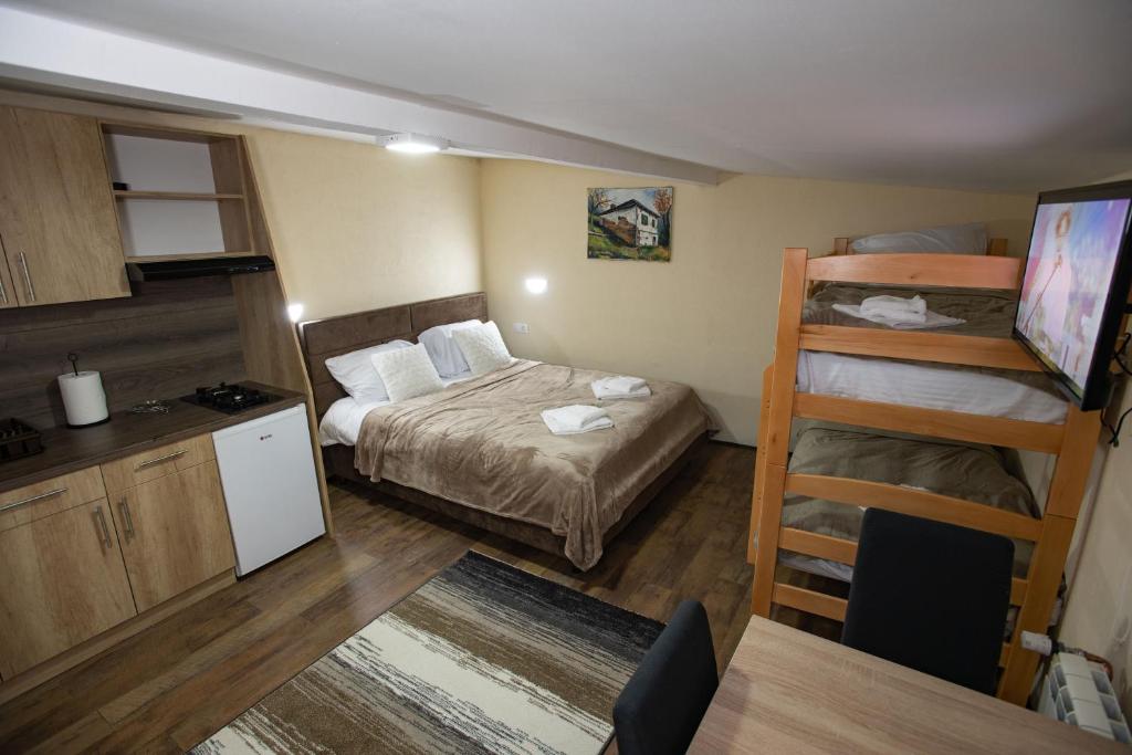 Letto o letti in una camera di Apartmani SP Jovanovic