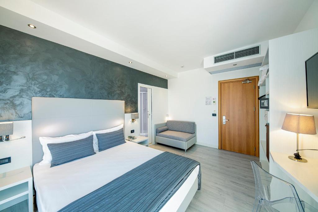 Postel nebo postele na pokoji v ubytování Hotel Sayonara