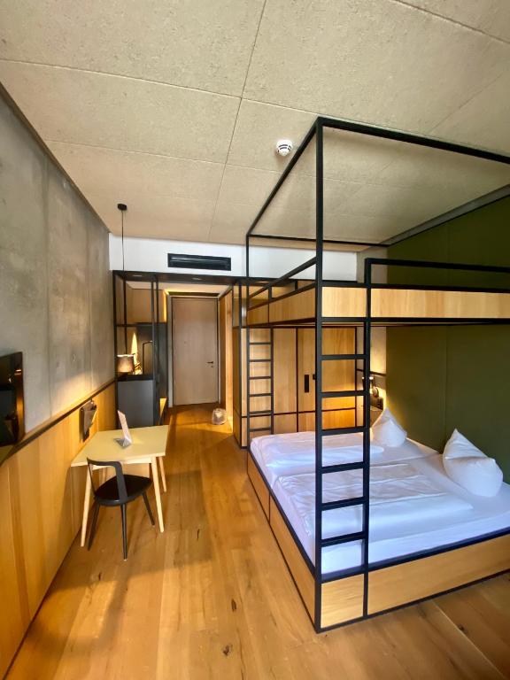 Postel nebo postele na pokoji v ubytování Gasthof-Hotel Höhensteiger
