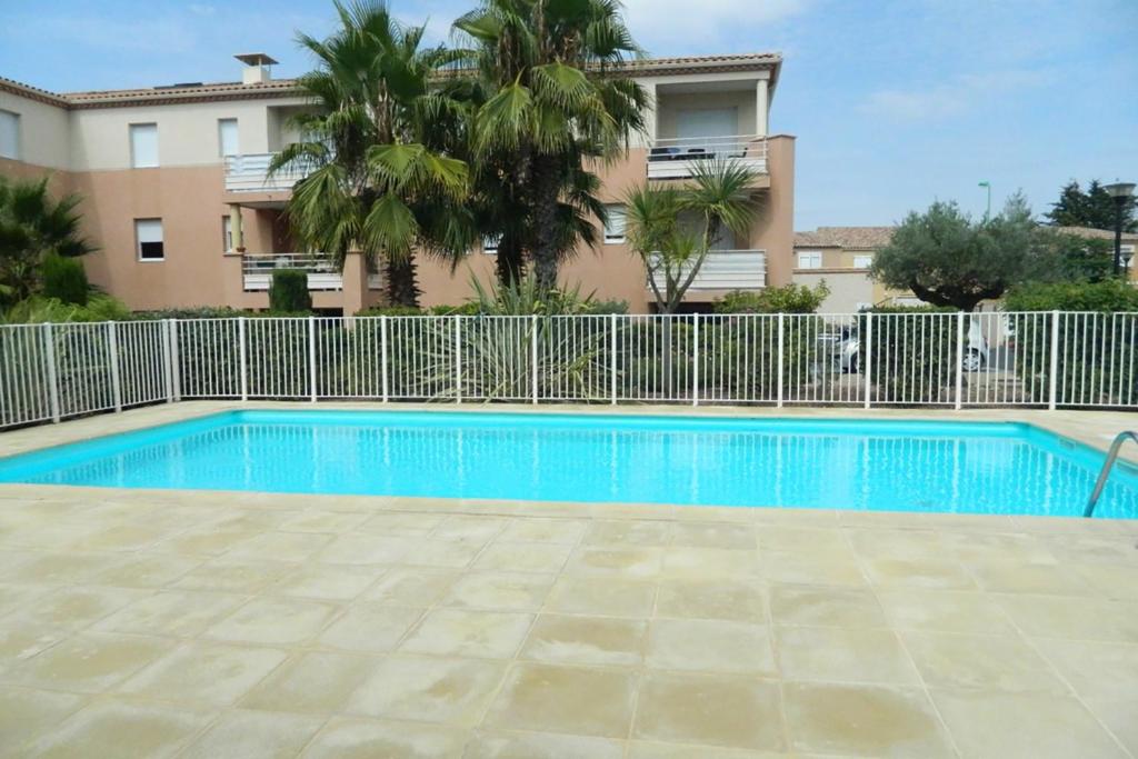 Bazén v ubytování Appartement moderne en résidence avec piscine nebo v jeho okolí