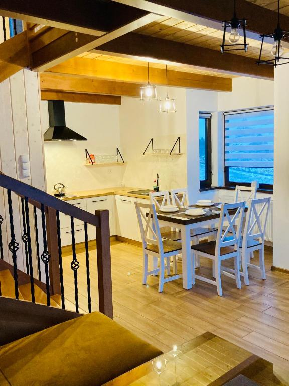 Kuchyň nebo kuchyňský kout v ubytování Apartamenty i Domki Orawskie