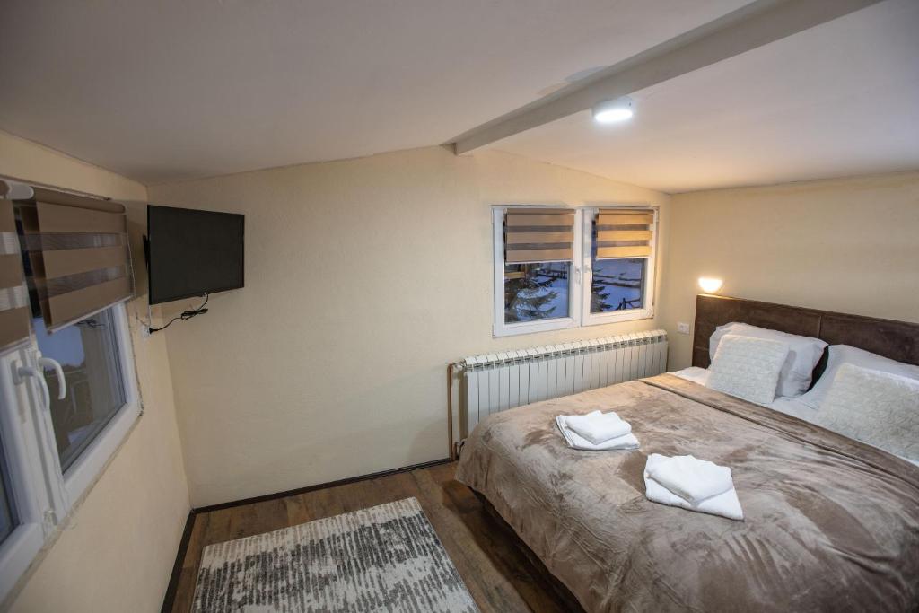 Letto o letti in una camera di Apartmani SP Jovanovic