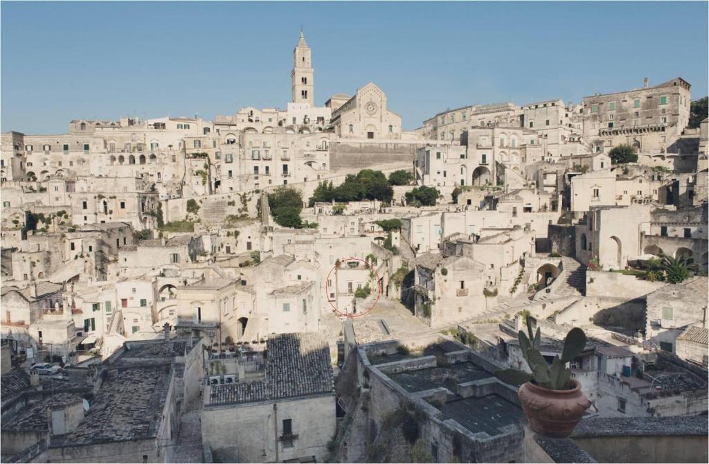 a view of a city with a bunch of buildings at Casa Vetere in Matera