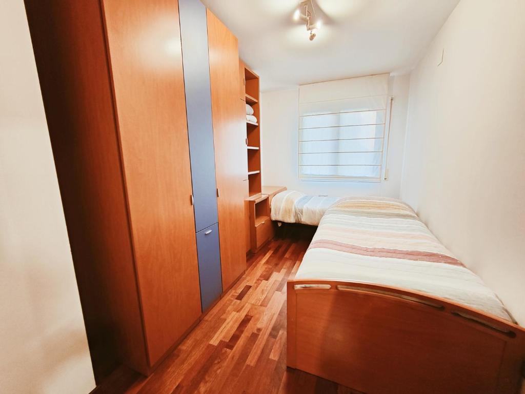 Postel nebo postele na pokoji v ubytování Agora Apartments