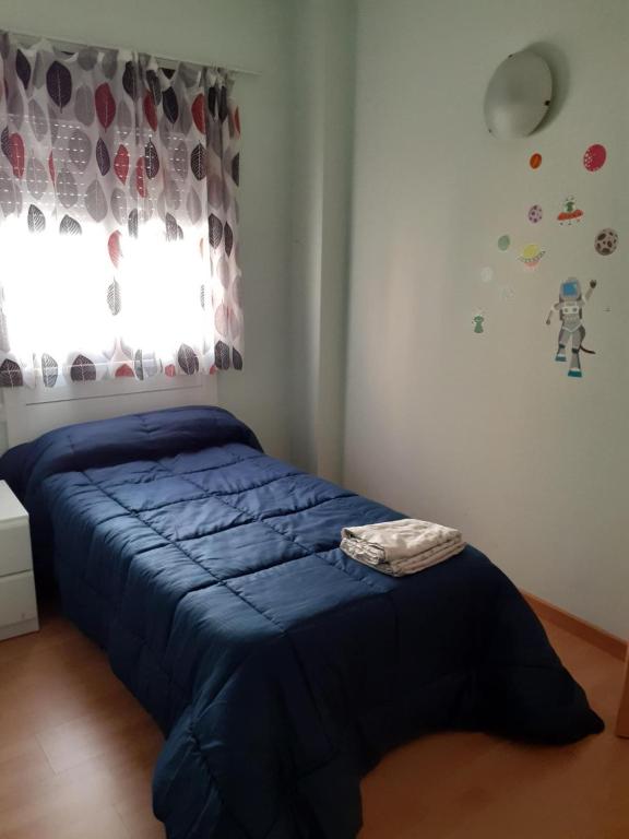 A bed or beds in a room at Duplex casco historico