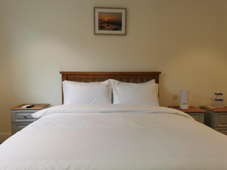 Letto o letti in una camera di Coliemore Acommodation Dalkey