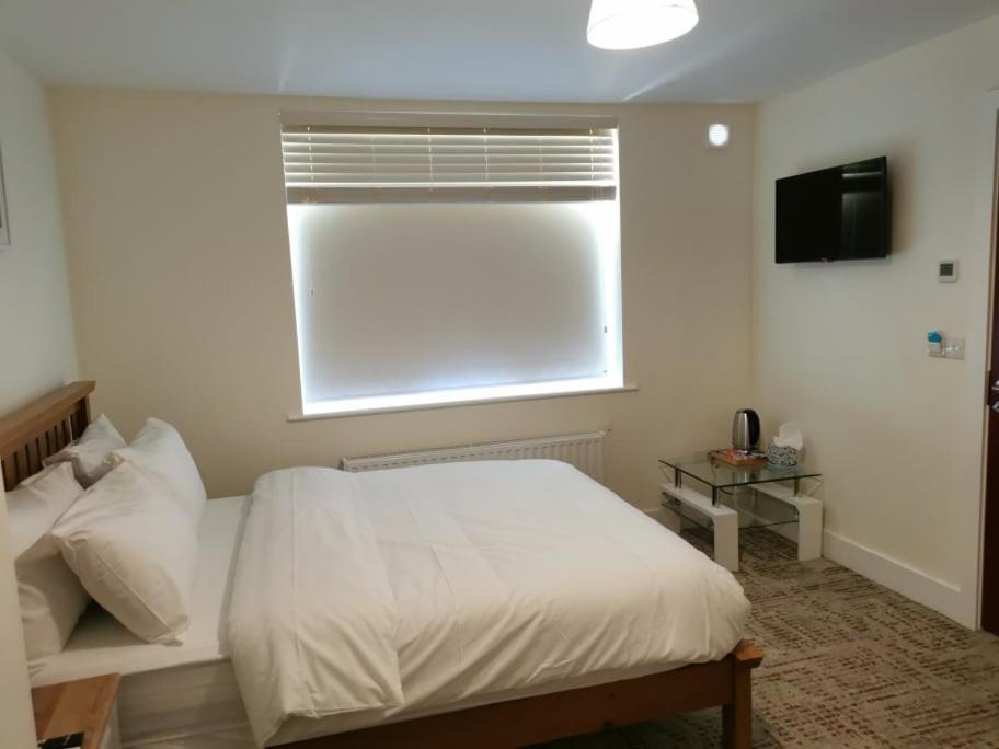 Letto o letti in una camera di Coliemore Acommodation Dalkey