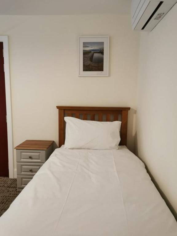 Letto o letti in una camera di Coliemore Acommodation Dalkey