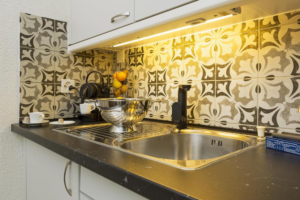 Monolocale con terrazzo vista lago Via Cassarinetta 7 by LR - Resim 13