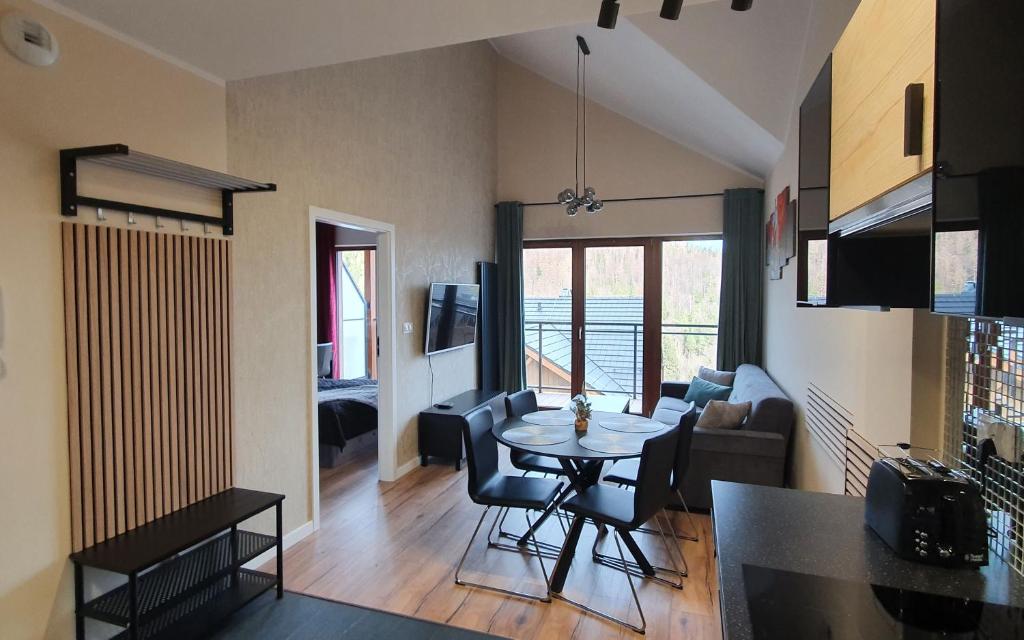 Posedenie v ubytovaní Karpatia Resort Apartament Krystallos