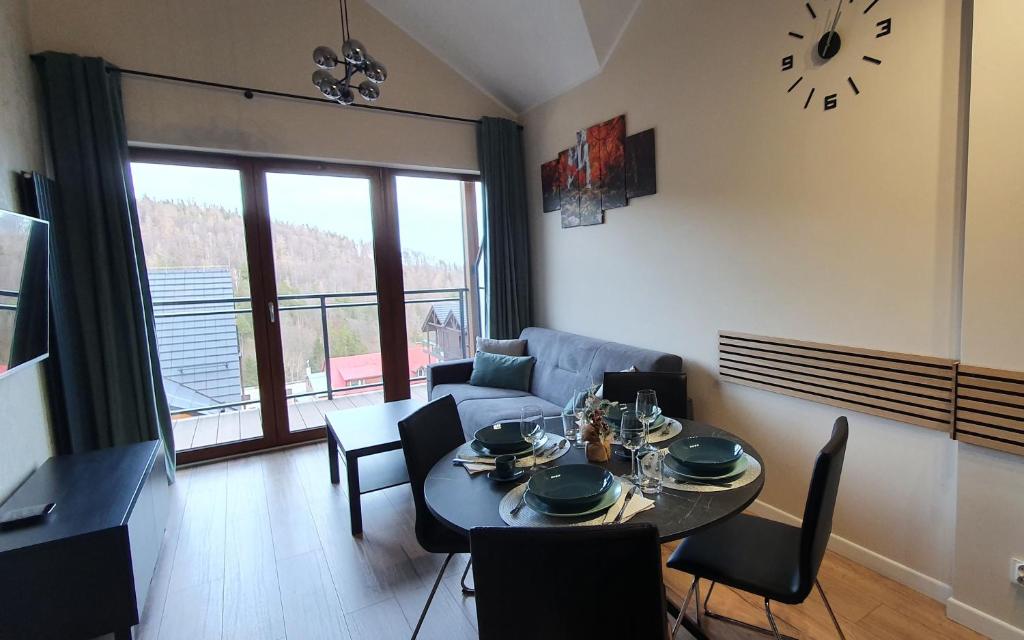 Posedenie v ubytovaní Karpatia Resort Apartament Krystallos