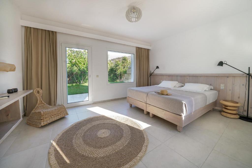 Postel nebo postele na pokoji v ubytování New Villa Komos in Pitsidia,Matala,Crete