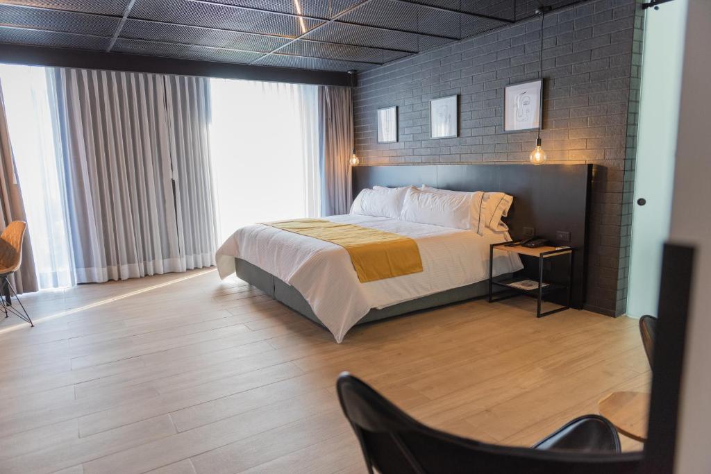 Postel nebo postele na pokoji v ubytování FULTON Business Luxury HOTEL