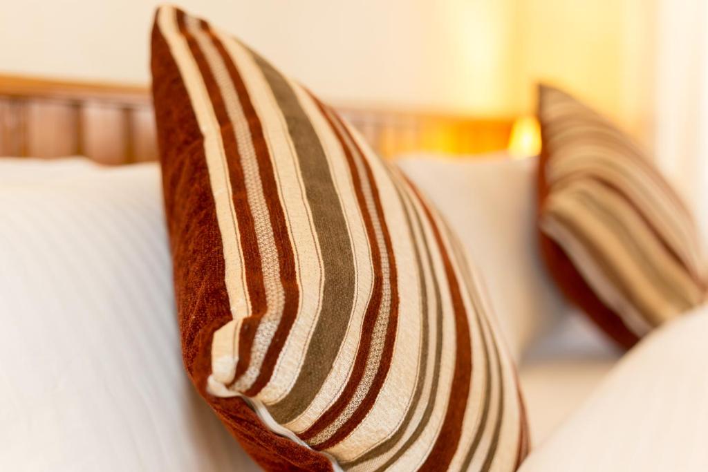 Postel nebo postele na pokoji v ubytování Siddhartha Boutique Hotel, Boudha