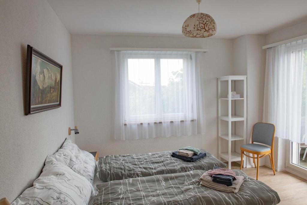 Postel nebo postele na pokoji v ubytování BnB Bergsicht