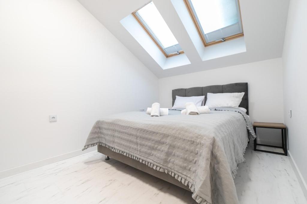Postel nebo postele na pokoji v ubytování Apartamenty Kalinowa z sauną i bawialnią - Dream Apart