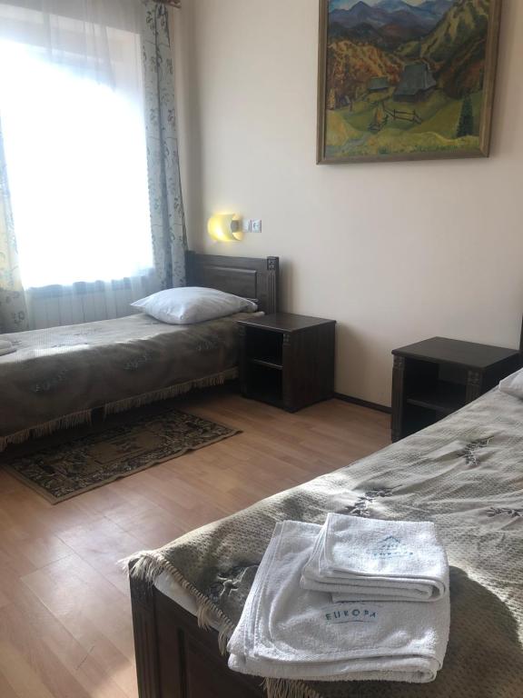 Postel nebo postele na pokoji v ubytování Europa