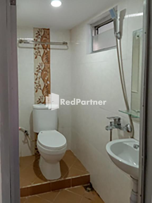 Koupelna v ubytování Hotel Trikatu Kendal near Taman Kota Weleri Mitra RedDoorz