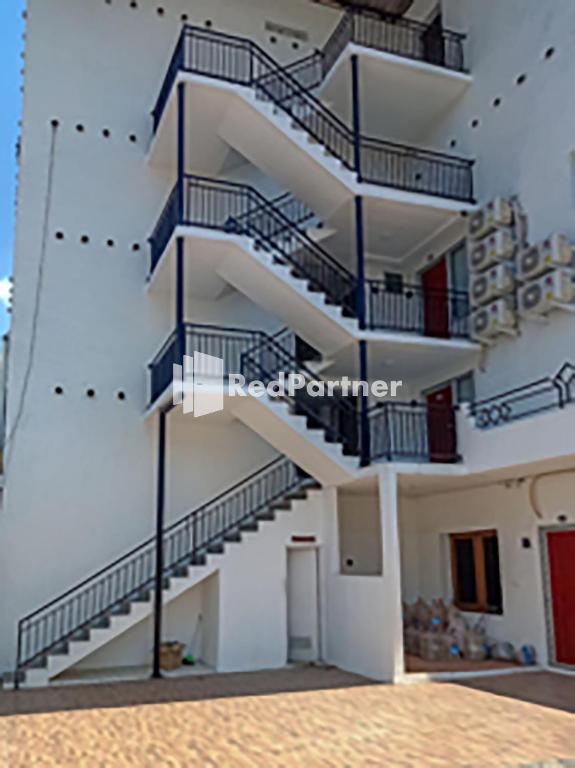 Balkón nebo terasa v ubytování Hotel Trikatu Kendal near Taman Kota Weleri Mitra RedDoorz