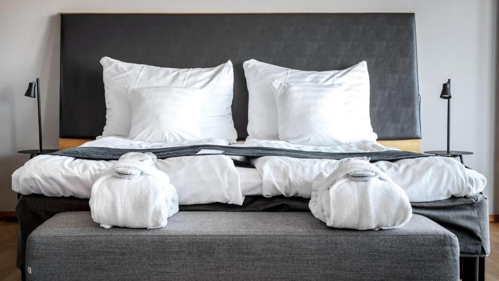Postel nebo postele na pokoji v ubytování Quality Hotel 11 & Eriksbergshallen