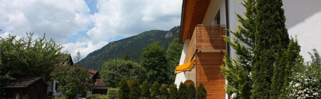 a building with a view of a mountain at Haus Bergland in Pfronten