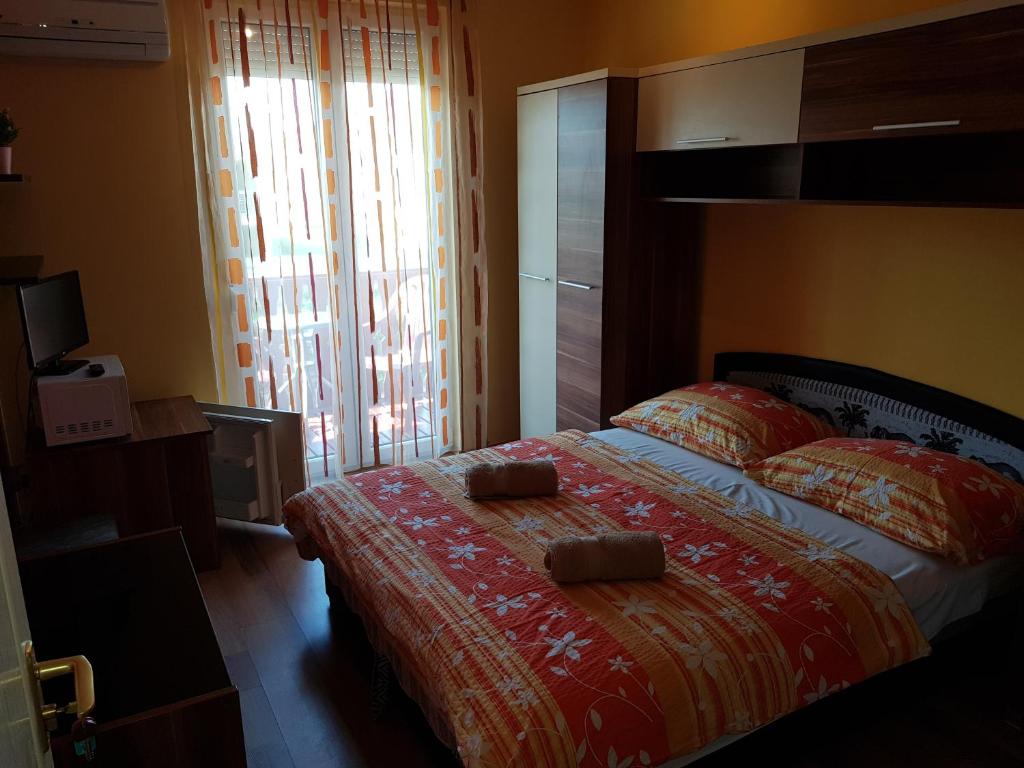 Postel nebo postele na pokoji v ubytování Napsugár Resort