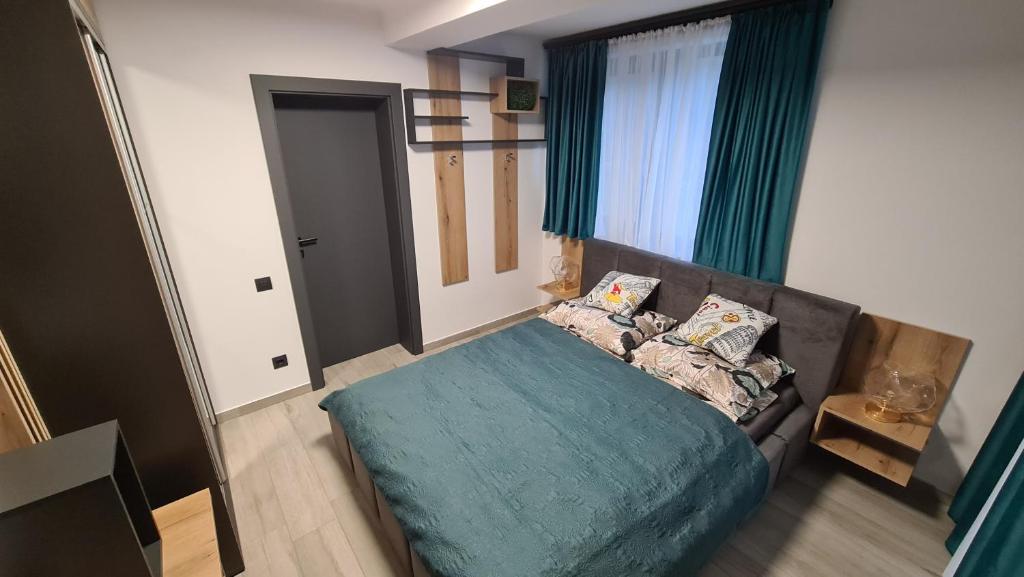 Postel nebo postele na pokoji v ubytování Complex Lunlo Village