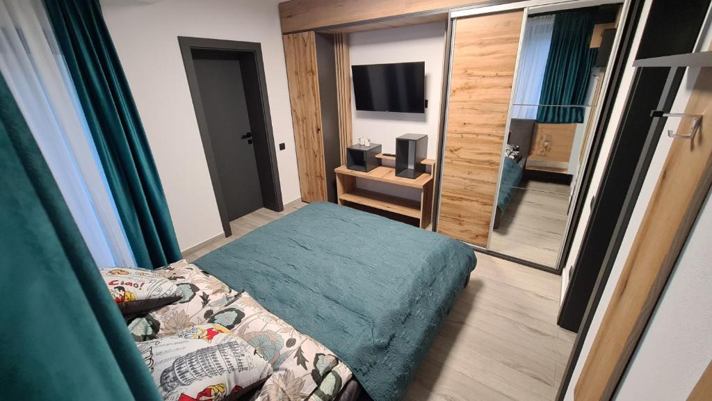Postel nebo postele na pokoji v ubytování Complex Lunlo Village