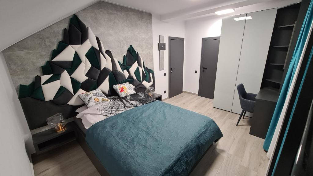 Postel nebo postele na pokoji v ubytování Complex Lunlo Village