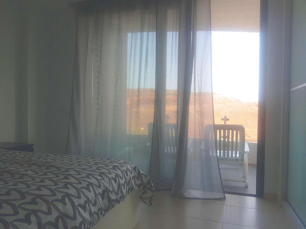 Posteľ alebo postele v izbe v ubytovaní Apartment Tenerife Sur