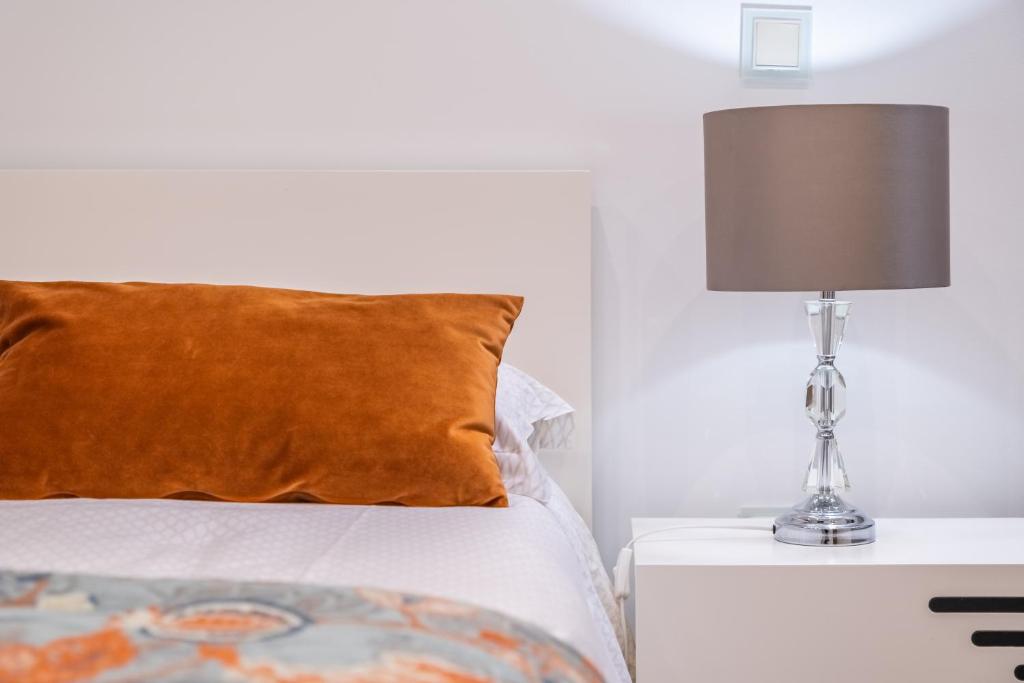 Postel nebo postele na pokoji v ubytování Hillside Villa