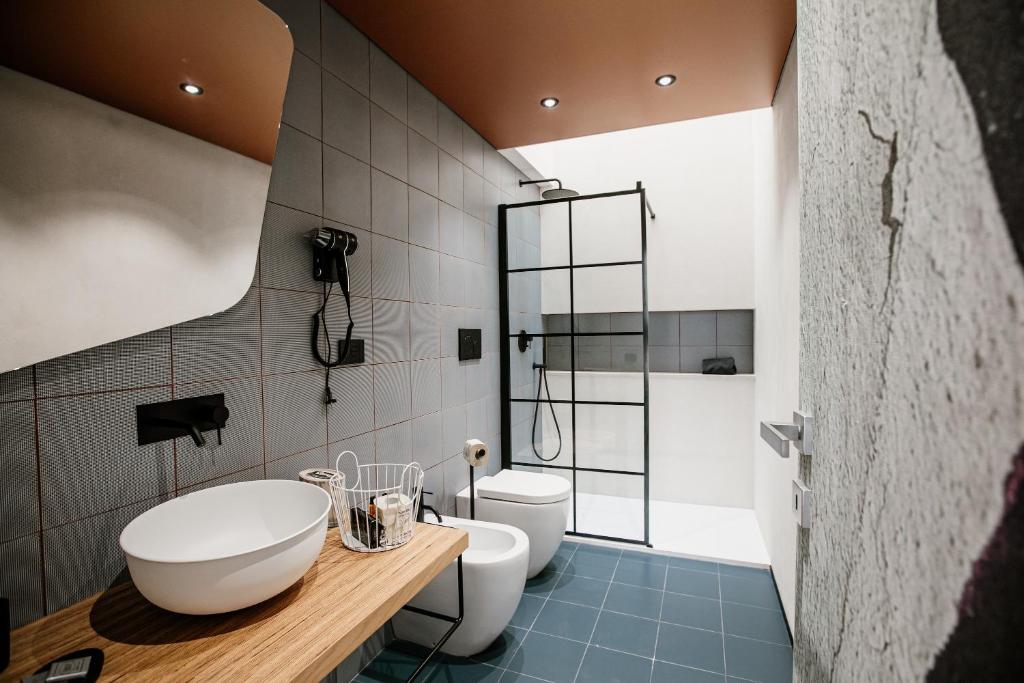 Koupelna v ubytování FICOPALA SUITES