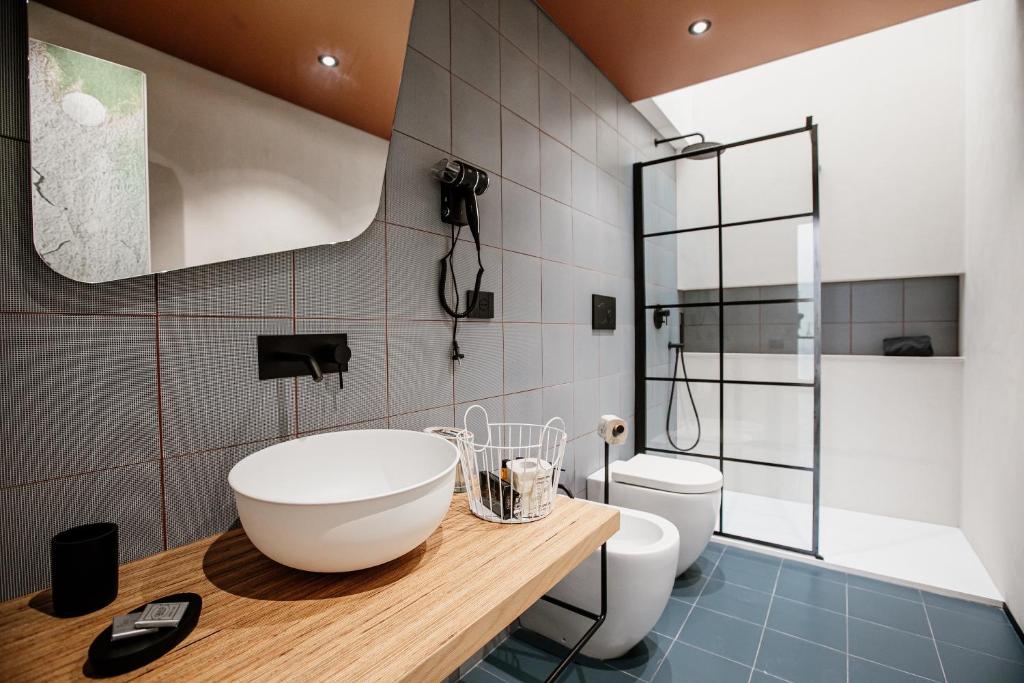 Koupelna v ubytování FICOPALA SUITES