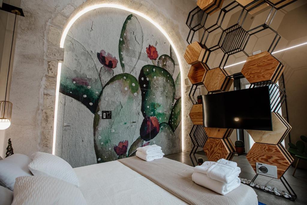 TV a/nebo společenská místnost v ubytování FICOPALA SUITES