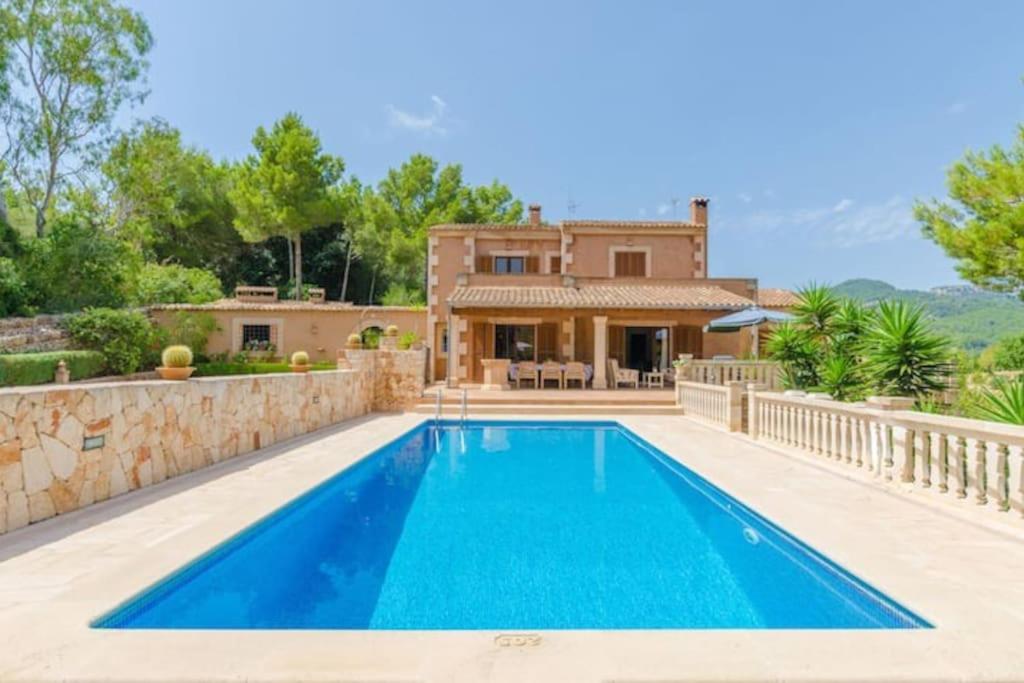 The swimming pool at or close to Es Turó de França