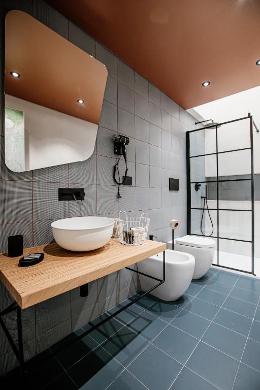 Koupelna v ubytování FICOPALA SUITES