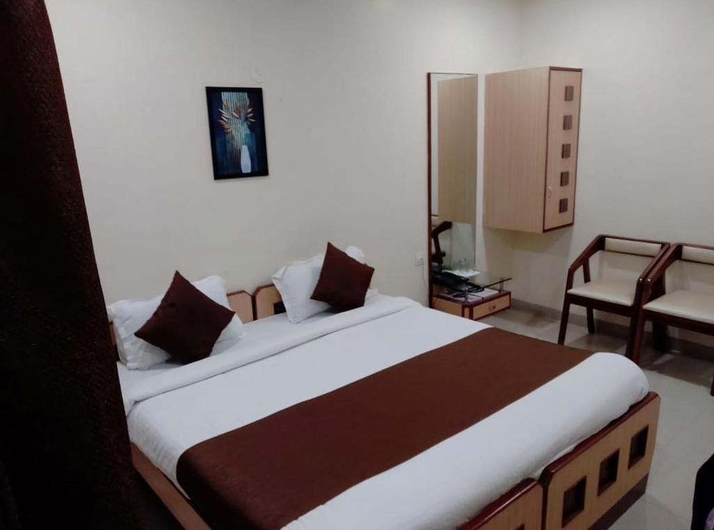 Postel nebo postele na pokoji v ubytování Aquarius Resort