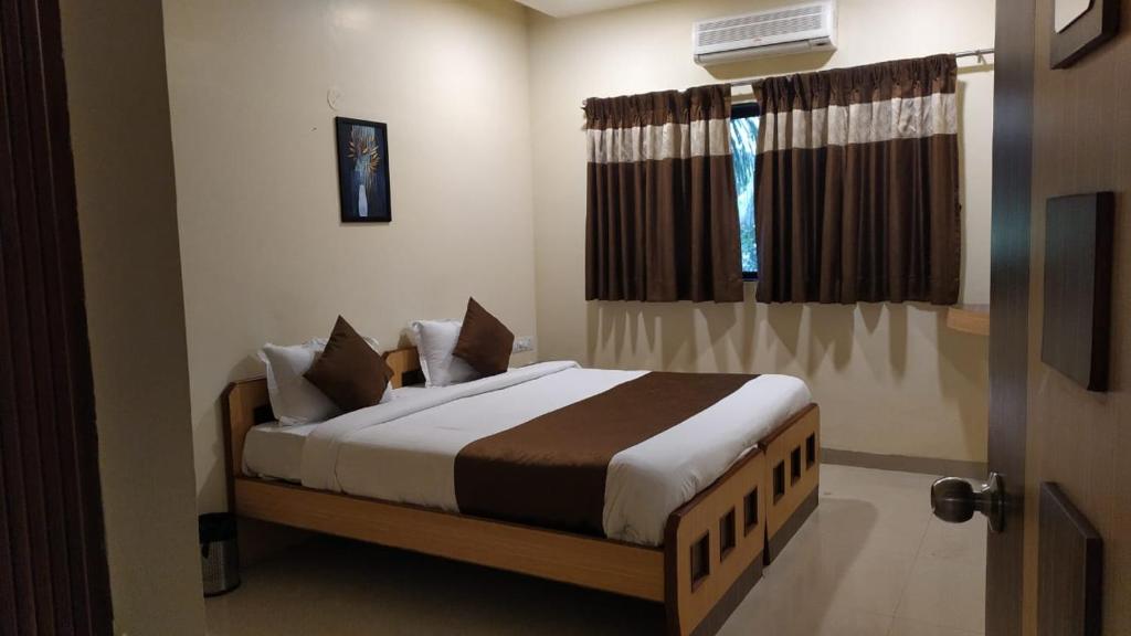 Postel nebo postele na pokoji v ubytování Aquarius Resort