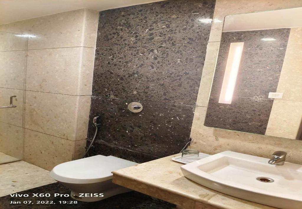Koupelna v ubytování Hotel M Grand